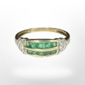 A 9ct gold emerald and diamond dress ring, size U1/2 CONDITION REPORT: 2.