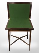 An Edwardian mahogany card table, width 52 cm.