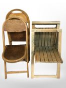 Two pairs of folding chairs.