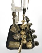 A continental patinated figural lamp base, two further lamps, a seven sconce candelabrum,