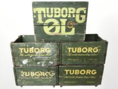 Five painted pine Tuborg bottle crates, each 47 cm wide.