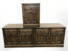 Three Ercol stained elm cupboards