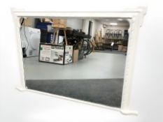 A painted overmantle mirror, 125 cm x 82 cm.