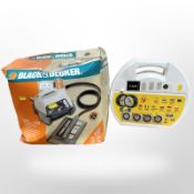 A set of snow chains and a paper stripper