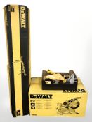 A Dewalt DW 708 circular saw in original box with DE 7023 work bench,