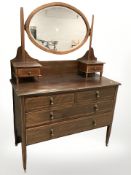 A late Victorian inlaid mahogany four drawer dressing chest, 105 cm x 46 cm x 156 cm.