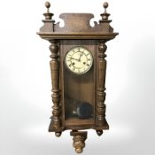 A Junghans beech wall clock with enamelled dial,