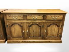 A contemporary ash sideboard, 151 cm x 50 cm x 85 cm.