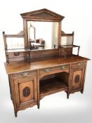 A late Victorian walnut mirror backed sideboard,