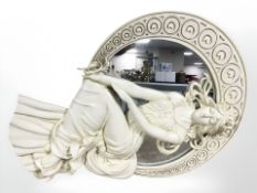A contemporary figural wall mirror depicting a lady,