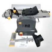 A Titan TT579PLN 1500W jointer planer with lead.