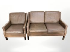 A late 20th century Danish brown stitched leather two seater settee,