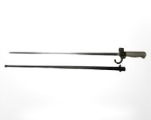 A French Lebel Epee Modele 1886 cruciform blade bayonet with white metal grips, in steel scabbard,