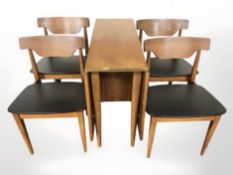 A 20th century teak drop leaf dining table,