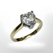 An 18ct gold diamond solitaire ring, the heart-shaped stone weighing an estimated 1.