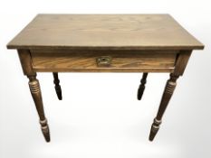 An early 20th century oak single drawer side table, 89 cm x 51 cm x 74 cm.