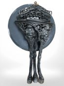 A Britannia cast iron pub table with painted wooden top.