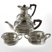 An EPNS four piece tea service, teapot 19 cm high.