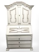 A 19th century painted and gilt secretaire bureau, 115 cm x 55 cm x 210 cm.