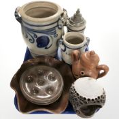 A group of continental earthenware pots, candle holder, pewter mounted stein, etc.