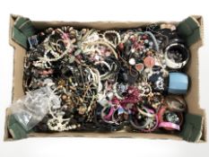 A large quantity of costume jewellery, necklaces, bangles,