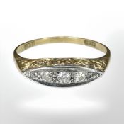 An 18ct gold five-stone diamond ring, size R CONDITION REPORT: 2.