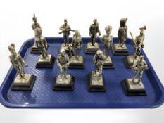 Twelve die cast metal figures of British soldiers