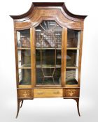 An early 20th century mahogany and satin wood inlaid display cabinet,