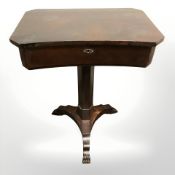 A 19th century mahogany tripod worktable with compartmentalised interior drawer, width 59 cm.