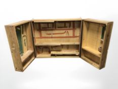 A vintage pine wall mounted tool cabinet, width 93 cm.