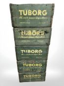 Five painted pine Tuborg bottle crates, each 47 cm wide.