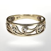 A 9ct gold ring set with small diamonds, size L CONDITION REPORT: 1.