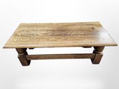 A reproduction oak coffee table,