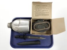 A British L1A3 bayonet with 20 cm single edged blade, in black painted scabbard,