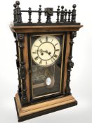 A 19th century continental walnut mantel clock,