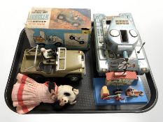 A 21 Toy climbing four wheel drive hurdler with driver, in original box,