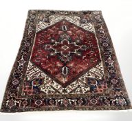 A Heriz carpet, North-West Iran, 290 cm x 197 cm.