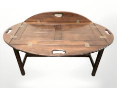 A mahogany butlers tray table on stand, width 93 cm.