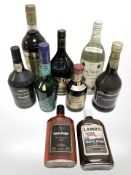 Nine various bottles of alcohol, including Captain Morgan rum, Lamb's Navy rum, Drambuie, Bailey's,