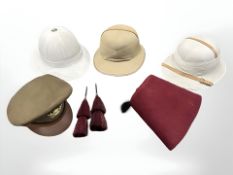 A 'Comfortease' khaki tropical helmet, a further Comfortease pith tropical helmet,