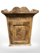A 19th century scumbled pine single door wall cabinet, 63 cm x 29 cm x 90 cm.