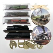 A group of scale model locomotives, two further models made of British coal,