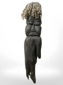 An African tribal carving, length 83 cm.
