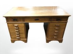 An early 20th century oak writing desk,