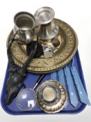 A pair of embossed brass chargers, pewter candle stand and tankard, pair of roe deer antlers,