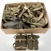 A quantity of 20th century British military webbing, canteens, etc.
