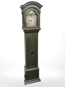 A continental painted long case clock with pendulum and weights,