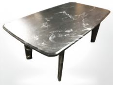 A Scandinavian black slate coffee table, 137 cm x 80 cm x 52 cm.
