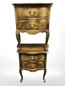 A pair of 20th century carved beech serpentine front two drawer bedside stands, each 55 cm wide.