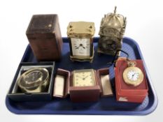 A brass cased Rapport quartz carriage timepiece, another in the form of a lantern clock,